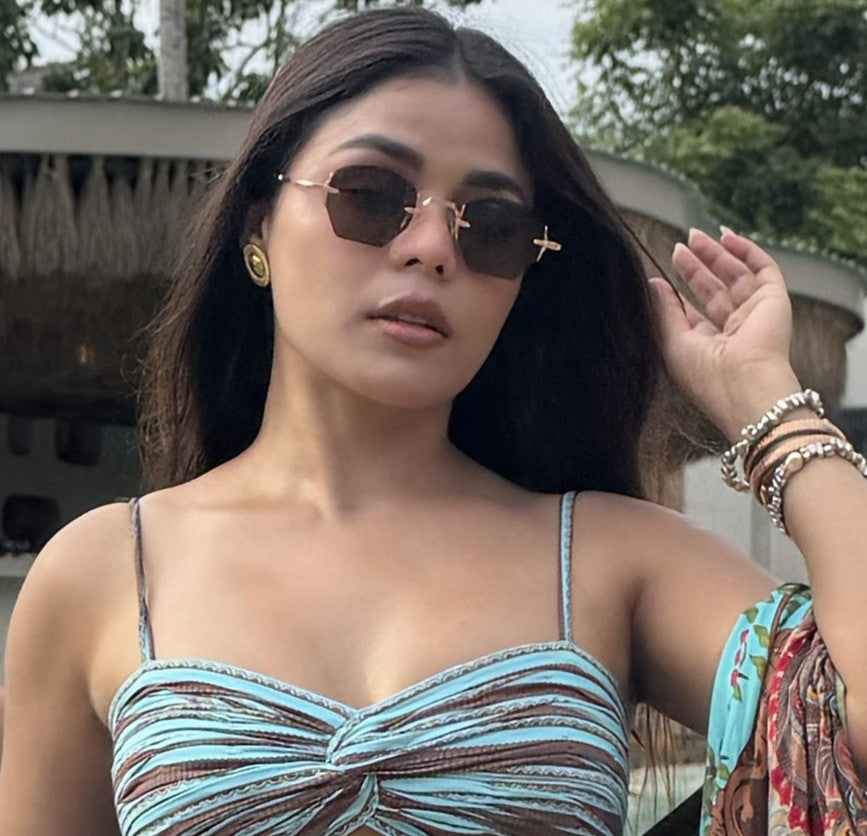 MONICA D'SOUZA WEARING CORTEZ SUN IN ROSE GOLD/ LIGHT BROWN