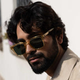 ANKUSH BAHUGUNA WEARING WILSON SUN IN CRYSTAL BROWN/GREEN