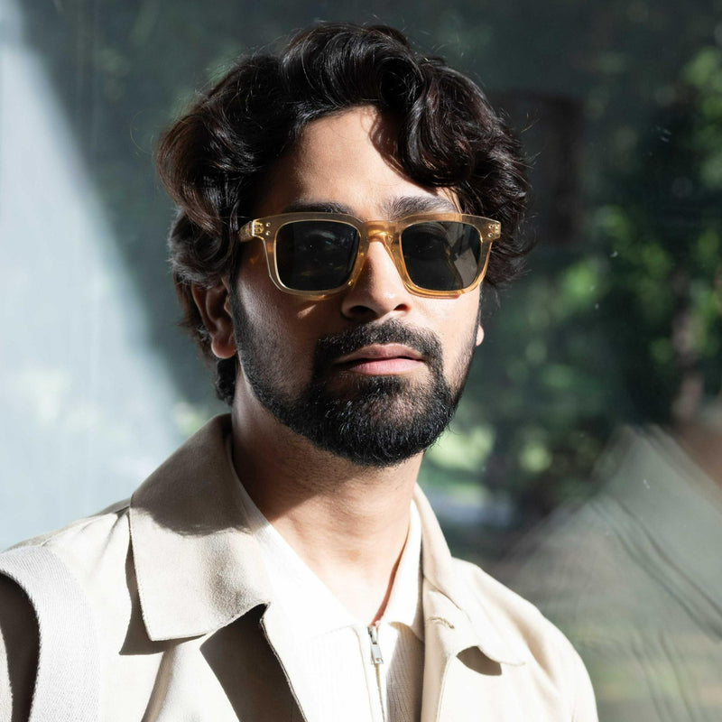 ANKUSH BAHUGUNA WEARING WILSON SUN IN CRYSTAL BROWN/GREEN