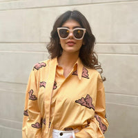 SANJANA SANGHI WEARING SHIRLEY SUN IN DUSTY PINK/ BROWN